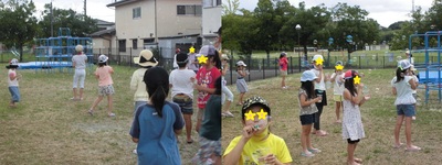 子どもたちがシャボン玉を作って遊んでいる写真