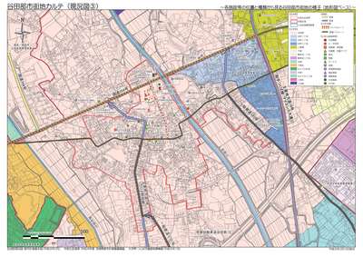 市街地の地図に赤ペンで印をつけている市街地カルテの写真