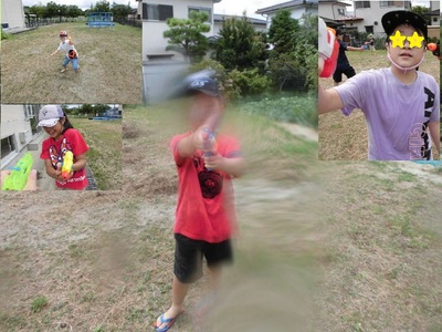 子どもたちがカメラに向けて水鉄砲の水をかけている写真