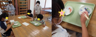 子どもたちがビー玉の箸つかみにチャレンジしている様子