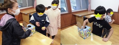 左：箱を押さえている先生とくじを引こうとしている子供たちの写真 右：テーブルの上に置かれた箱に手を入れてくじを引く子供の写真